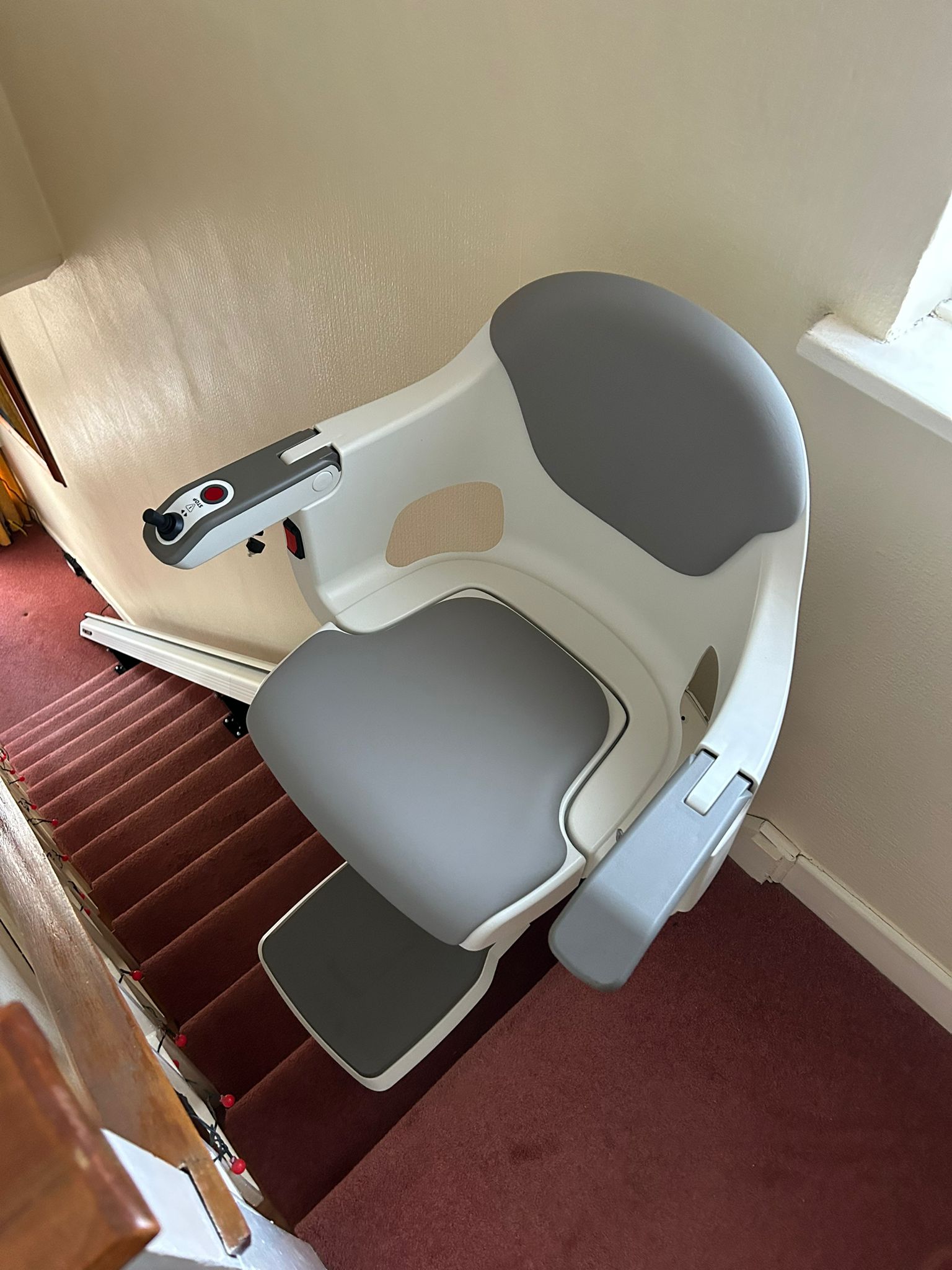 white & grey straight stairlift